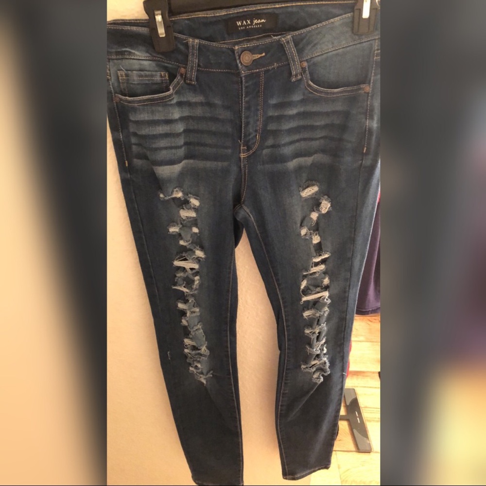 Distressed jeans.